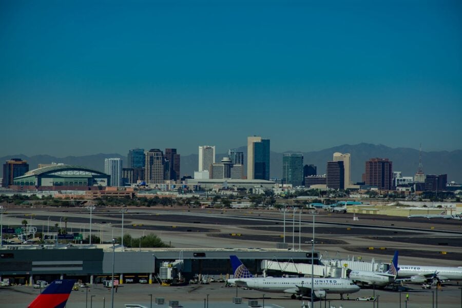 birds eye view of Phoenix Sky Harbor International Airport with city of Phoenix behind airport